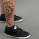 Image for article titled Rex Ryan's New Calf Tattoo Is Really Awful